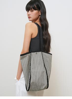 Reversible striped pattern bag