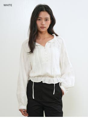 Frill-neck cropped lace blouse