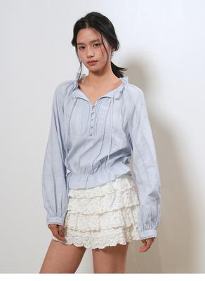 Frill-neck cropped lace blouse